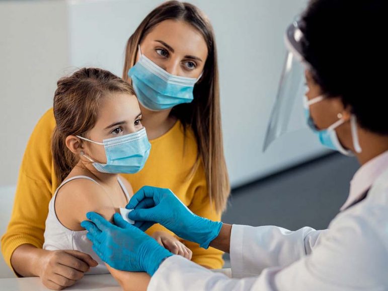 Child getting a vaccine shot
