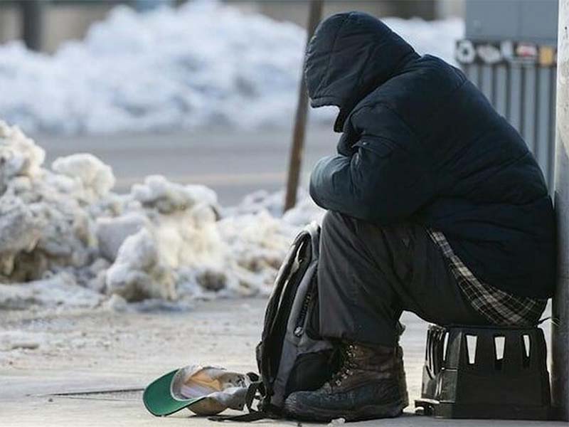 Homeless person out in the cold