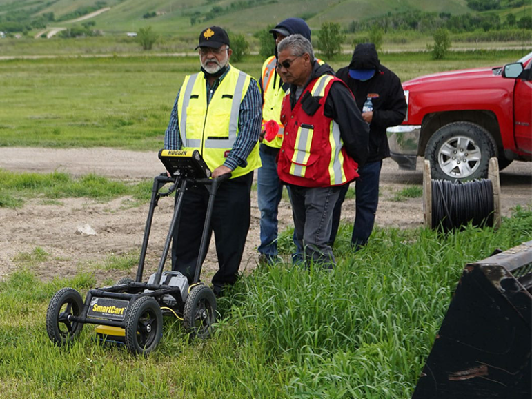 Workers with ground penetrating radar on Cowessess First Nation in Saskatchewan.