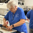 Johanna Hill of Coventry Relief Kitchen preparing homemade potato soup.