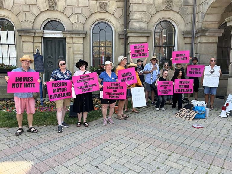 Protesters in front of Victoria Hall