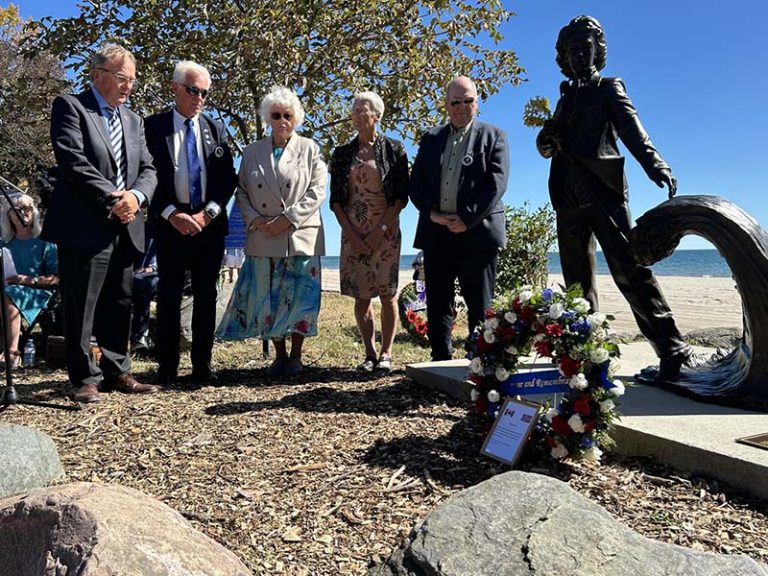 The daughters of Fern Blodgett Sunde and representatives from Norway lay a wreath in honour of Blodgett Sunde. Photo by Dan Jones, CFWN, LJI