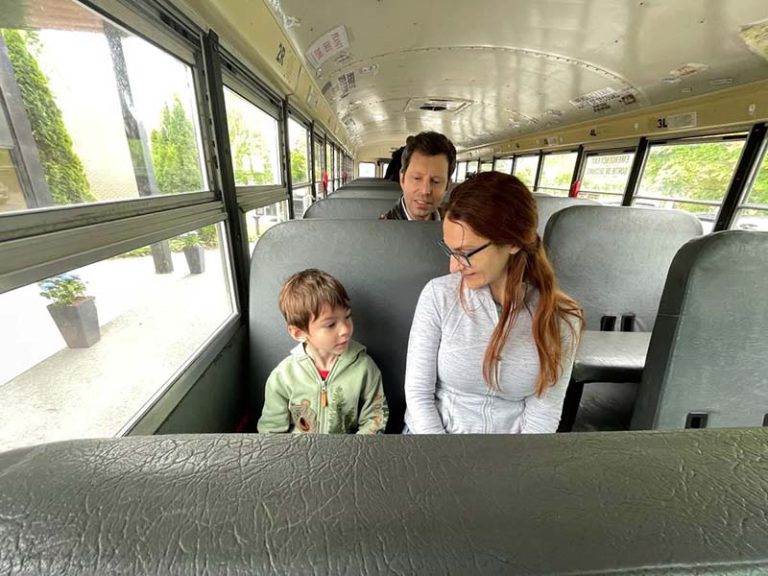 Sitting on the school bus. Photo courtesy of Five Counties Children's Centre Facebook. Play