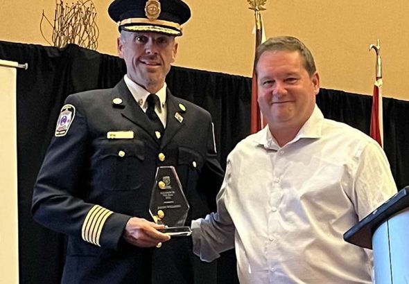 Port Hope Fire Chief Jason Williams and Don Casey, the Vice President of the OMFPOA during recent award ceremony for Fire Chief of the Year 2026
