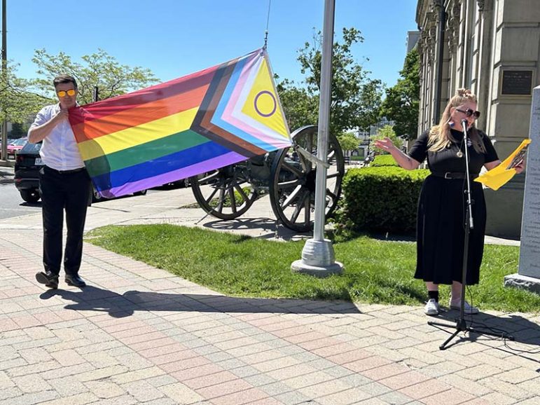 Cobourg Mayor Lucas Cleveland and Ashley Bauman rasing the Pride Flag in Cobourg. Photo by Dan Jones, CFWN, LJI