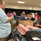 Volunteers prepare 850 backpacks for Northumberland County children in need for back-to-school. Photo by Dan Jones, CFWN, LJI.