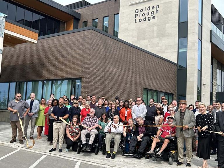 Ribbon cutting to open the New Golden Plough Lodge. By: Dan Jones, CFWN, LJI.